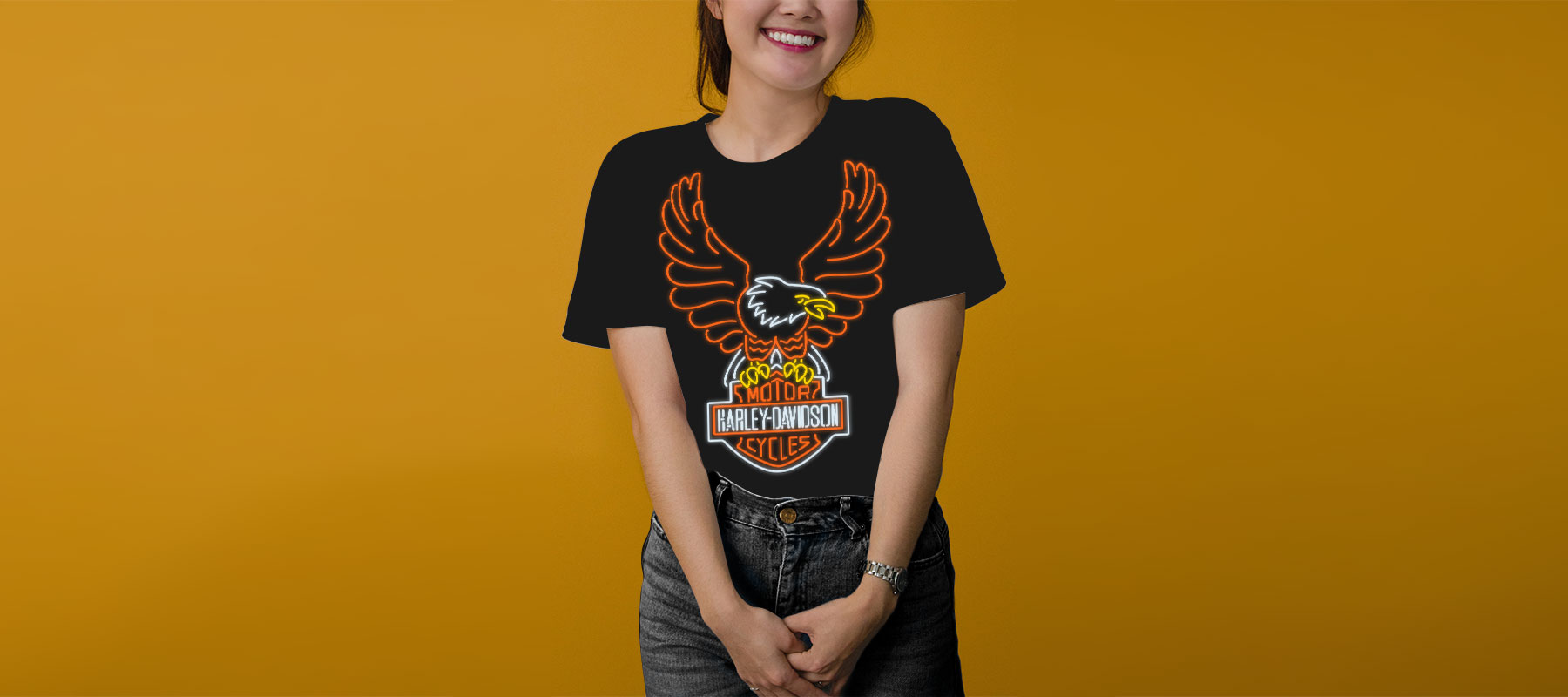 girl wearing neon eagle shirt