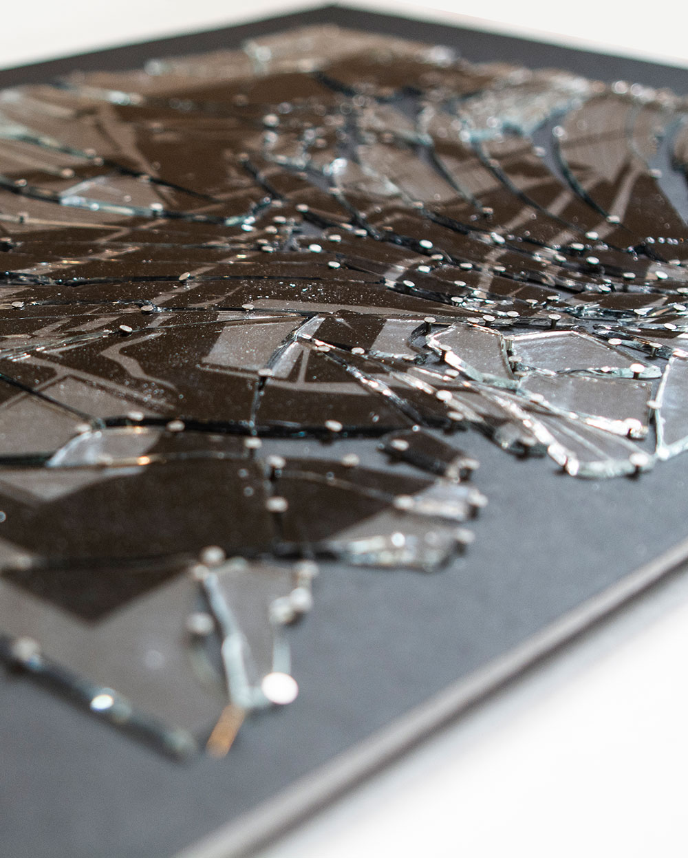 Close up of 5-26-17 Printed on broken glass